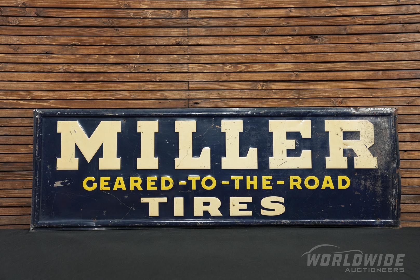  Miller Tires Embossed Tin Sign  