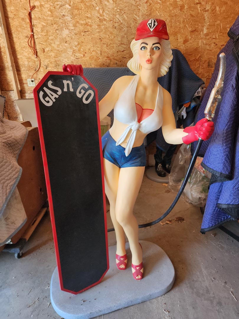 Gas N' Go Girl Statue with Chalkboard Sign